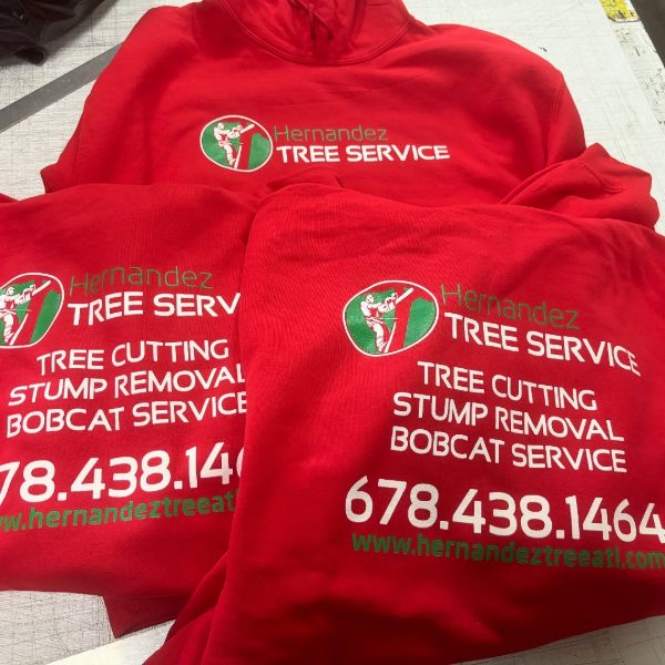 Red tree service hoodies printed with services and phone number